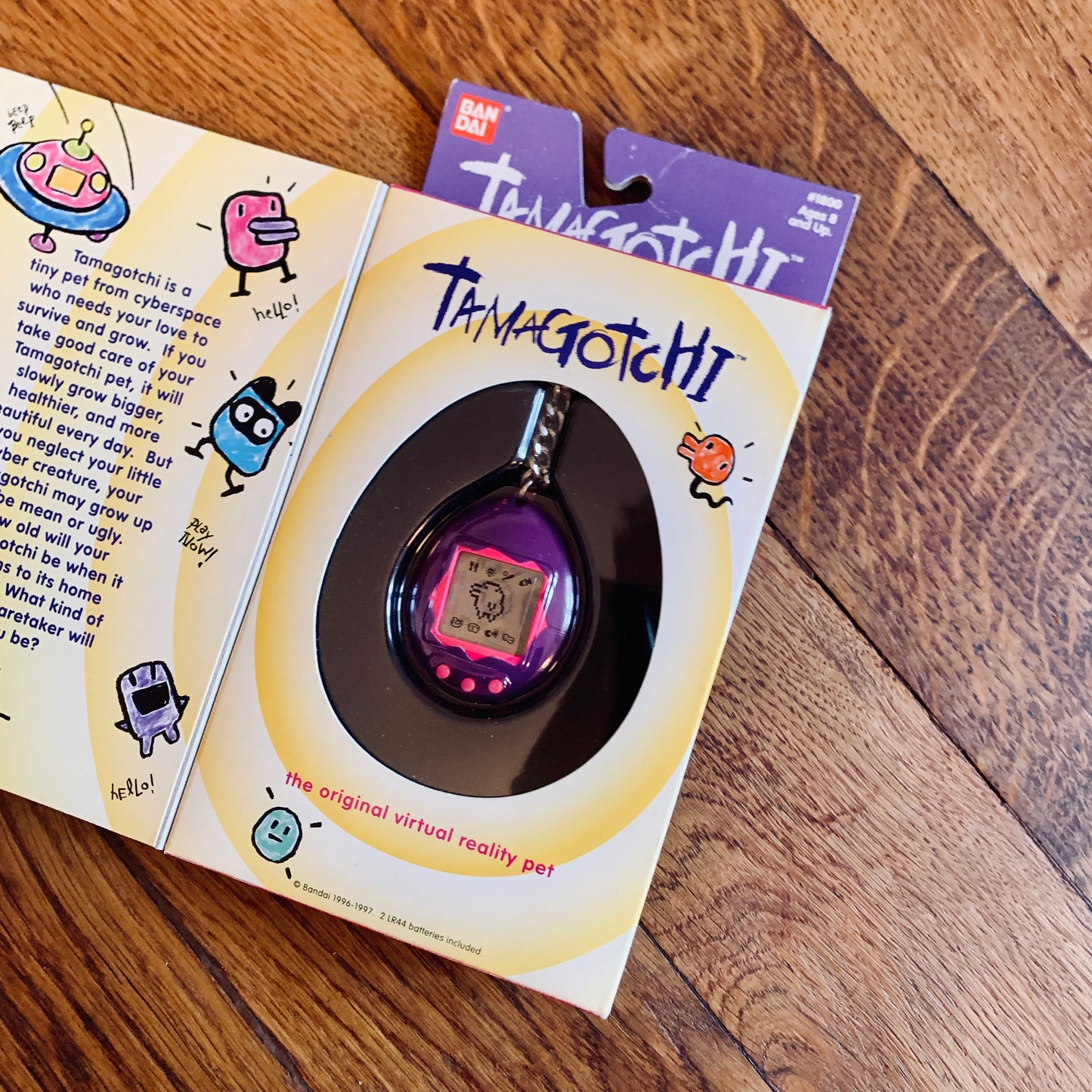Tamagotchi Bandai #1800 con scatola Prima Serie Walmart - USA 1997