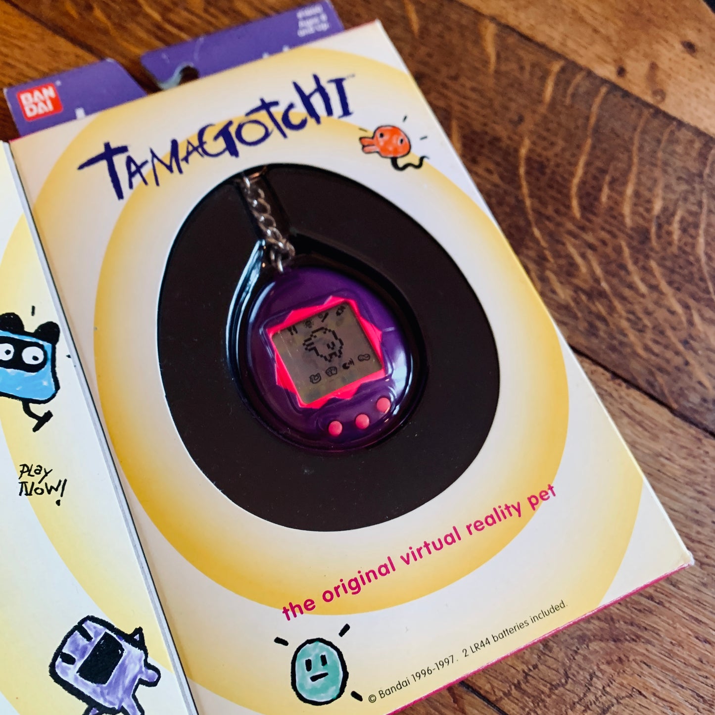 Tamagotchi Bandai #1800 con scatola Prima Serie Walmart - USA 1997