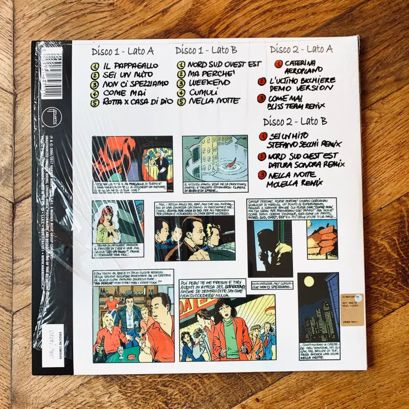 Copertina o quarta di copertina di un album con grafica in stile fumetto ed elenchi di brani musicali.
